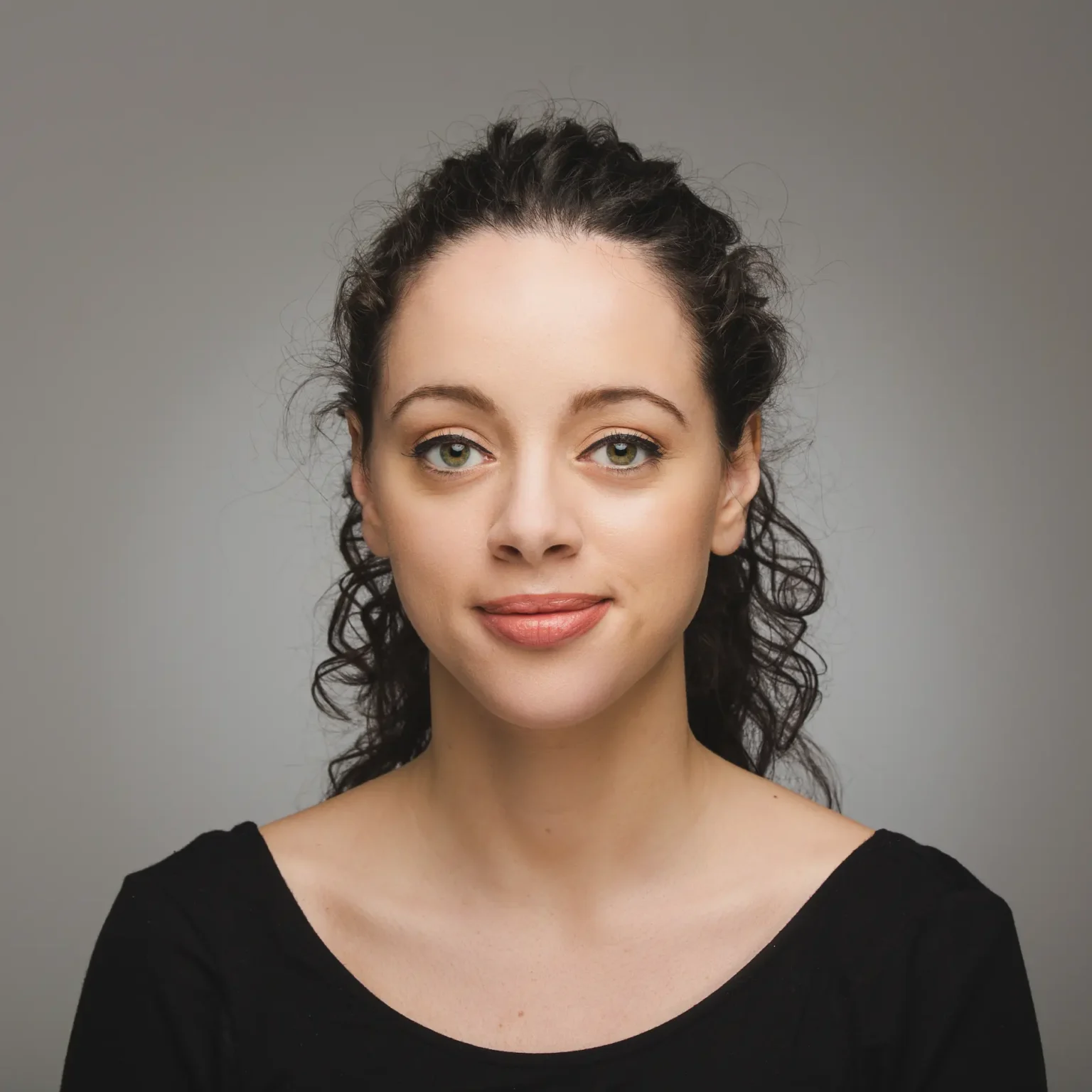 Portrait of an attractive woman with curly hair